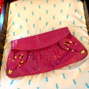Pink hype clutch, gold buckles and studs